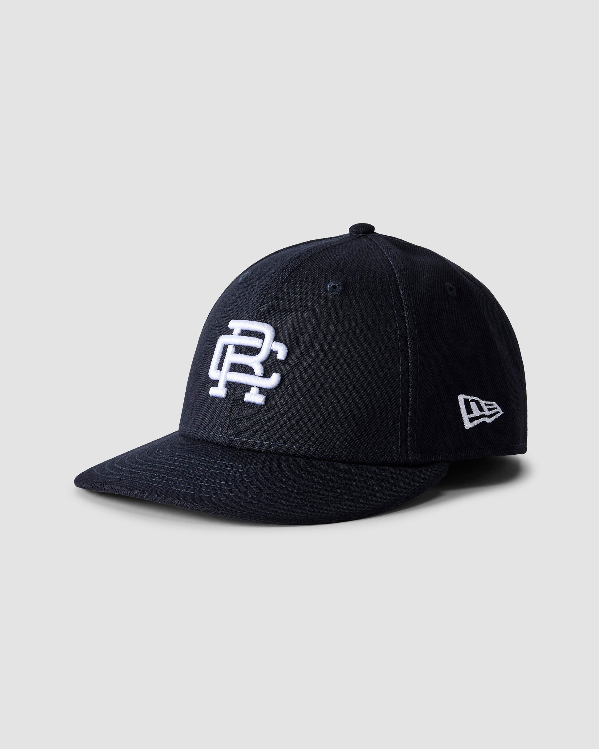New Era Low Pro 59Fifty Monogram Cap Reigning Champ
